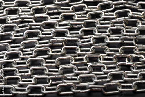 Link of a metal chain. Metal chain. Metal chain close up.