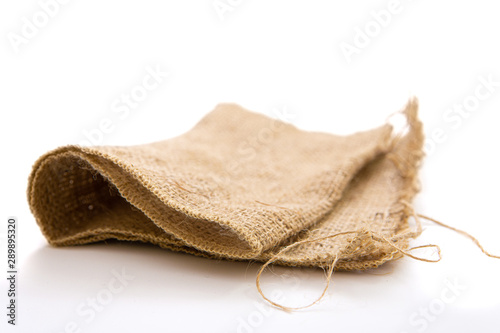 pieces of gunny sack against an isolated white background