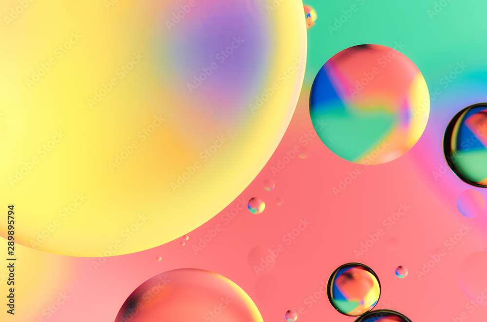 Colorful abstract images of oil drops on water. Colored circles and waves as a concept of scientific discovery, space or molecular research. Colorful abstract images of oil drops on water. Colored circles and waves as a concept of scientific discovery, space or molecular research.
