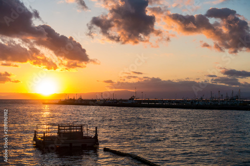 Sunset  by the seaside  at the pier.