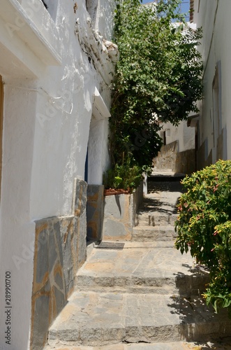 Stone stairs in narrow alley in Casares  Andalusia  Spain