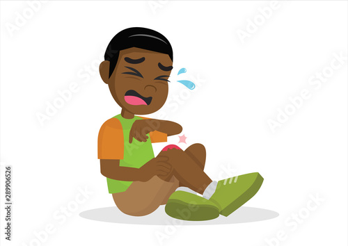 African boy having bruises on his leg.