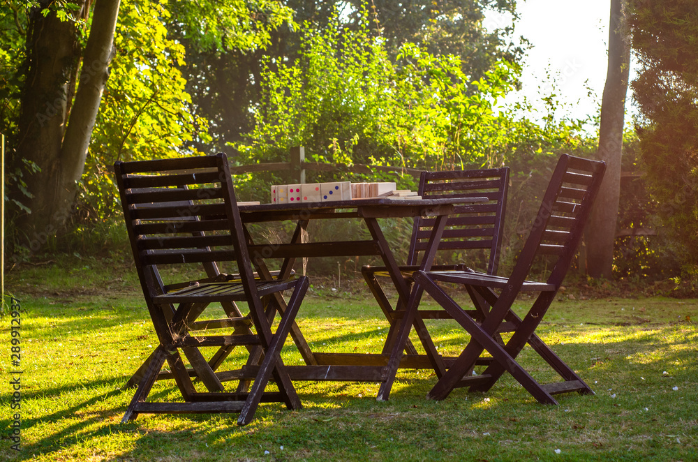 Garden chairs and table in summer