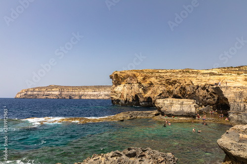 Fototapeta Naklejka Na Ścianę i Meble -  Panorama view at the coast of Dwejra Bay with the ruin of Azure Window on Gozo island in Malta