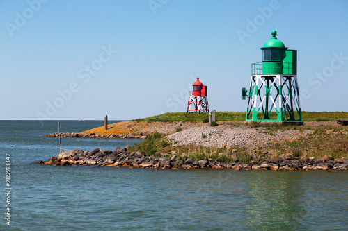 Harbor lights at the entrance of harbor of Stavoren, Friesland, Netherlands photo