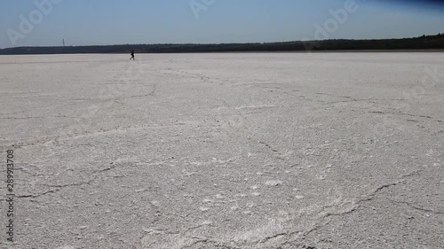 Crystallized salt at the bottom in the upper Kuyalnitsky estuary. Kuyalnik Estuary, Ukraine photo