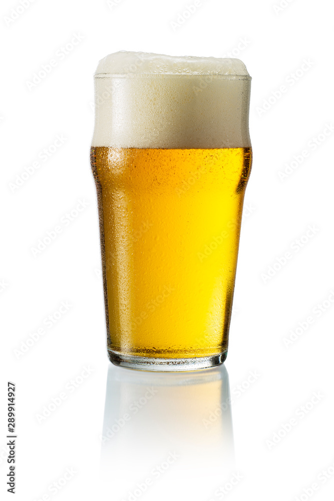 Glass of blonde beer with foam Glass of blonde beer with foam