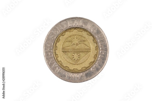 A close up image of a Filipino ten piso coin isolated, close up in macro, on a white background