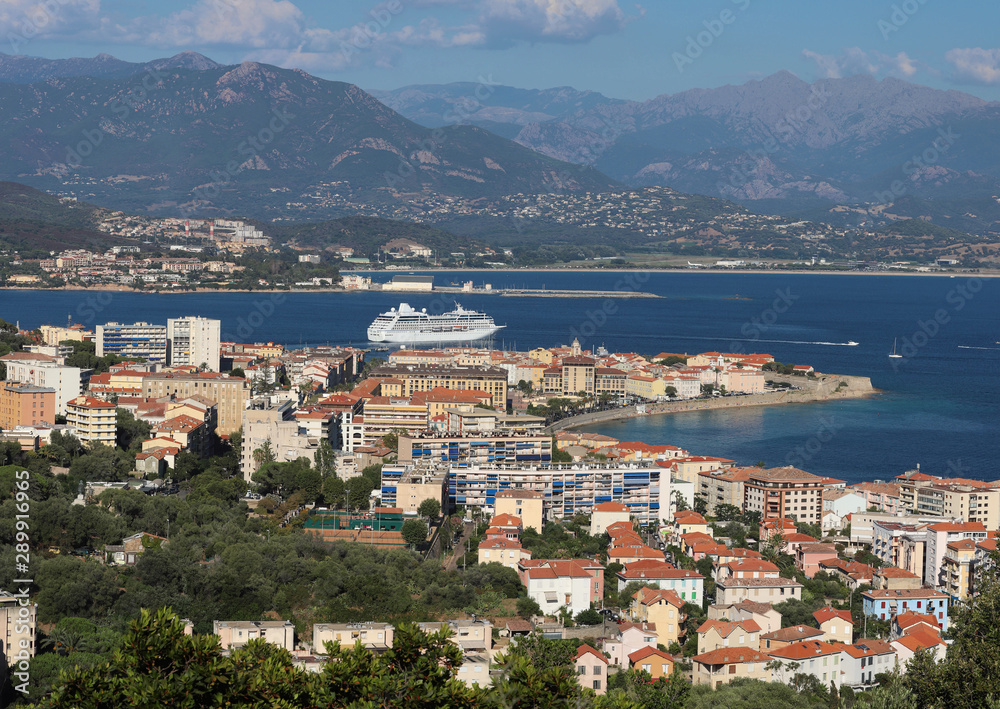 Aerial view of Ajaccio, Corsica, France. The harbor area and city seen from the mountains.