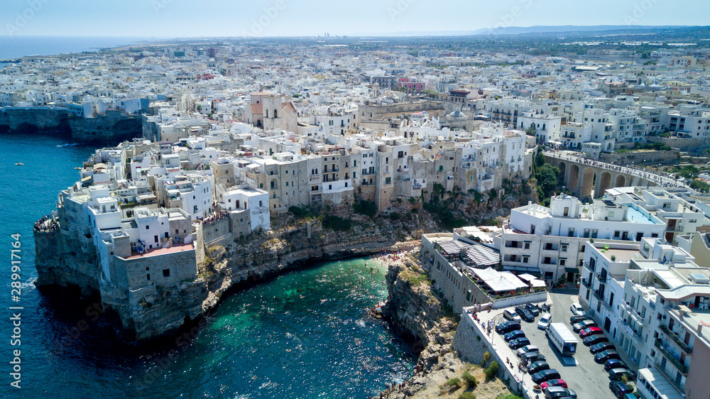 Obraz premium Aerial photo shooting with drone on Polignano a Mare, famous Salento city on the Mediterranean sea