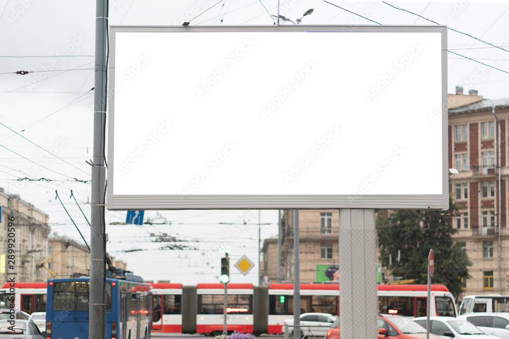 Big billboard in the city during the day against the background of the city. mockup advertising. Big billboard in the city during the day against the background of the city. mockup advertising.