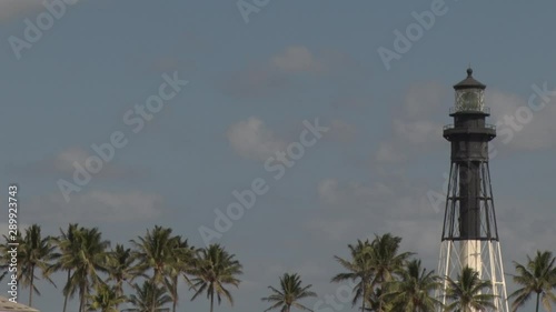 Pompano Beach Lighthouse on the Intracoastal Waterway at the Hillsboro Mile in a Spring Afternoon, Blue Sky with Scattered Clouds
