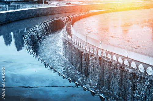 Modern urban wastewater treatment plant, blue toned photo