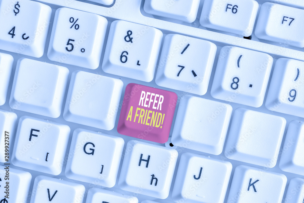 Word writing text Refer A Friend. Business photo showcasing direct someone to another or send him something like gift White pc keyboard with empty note paper above white background key copy space Word writing text Refer A Friend. Business photo showcasing direct someone to another or send him something like gift White pc keyboard with empty note paper above white background key copy space