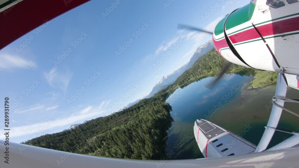 airplane in flight over a lake airplane in flight over a lake