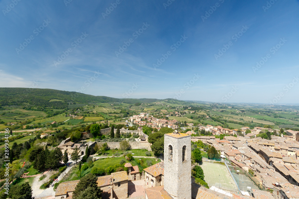 Wide angle view of San Gimignano, a small walled medieval hill town in the province of Siena, Tuscany, north-central Italy, taken from the top of one of the towers