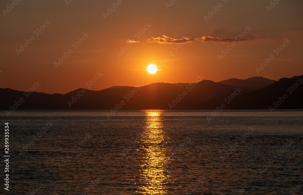 Beautiful bright sunset over the sea. Great travel view. Amazing nature paradise. Impressive summer panorama. Beautiful bright sunset over the sea. Great travel view. Amazing nature paradise. Impressive summer panorama.