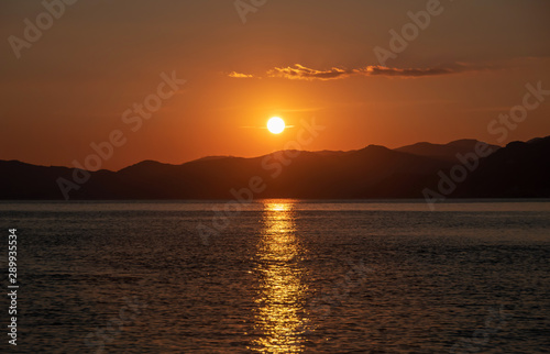 Beautiful bright sunset over the sea. Great travel view. Amazing nature paradise. Impressive summer panorama.
