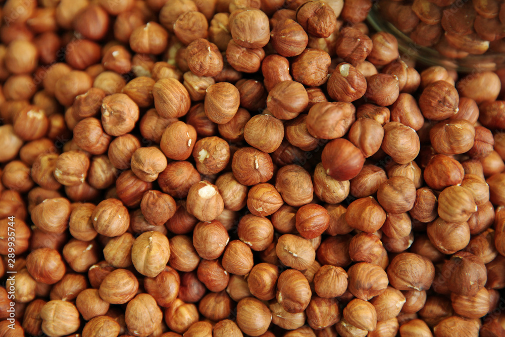Hazelnuts without shells. Background of many new crop nuts Hazelnuts without shells. Background of many new crop nuts