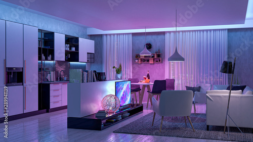 Modern Livingroom with multicolor led light by night - Smart home photo