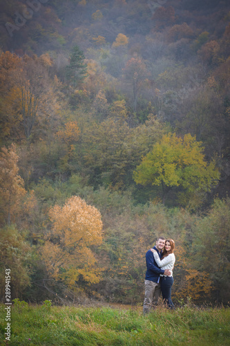 Couple having fun outside, autumn vibes. Outdoors, nature, romantic concept © stivog