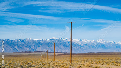 Utility Poles in the Desert © Wenli
