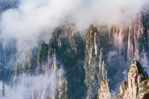 Fototapeta Naklejka Na Ścianę i Meble -  Clouds above the peaks of Huangshan National park.