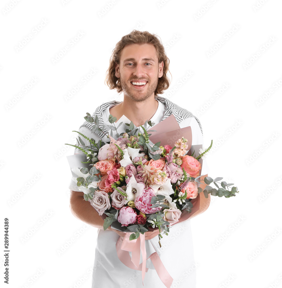 Young handsome man with beautiful flower bouquet on white background Young handsome man with beautiful flower bouquet on white background