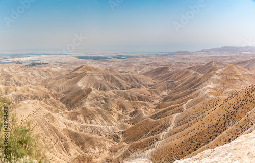 View of the Jordan Valley With Dead Sea and Jericho on the Horizon photo