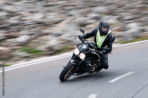 Motorcycle leaning into the curve