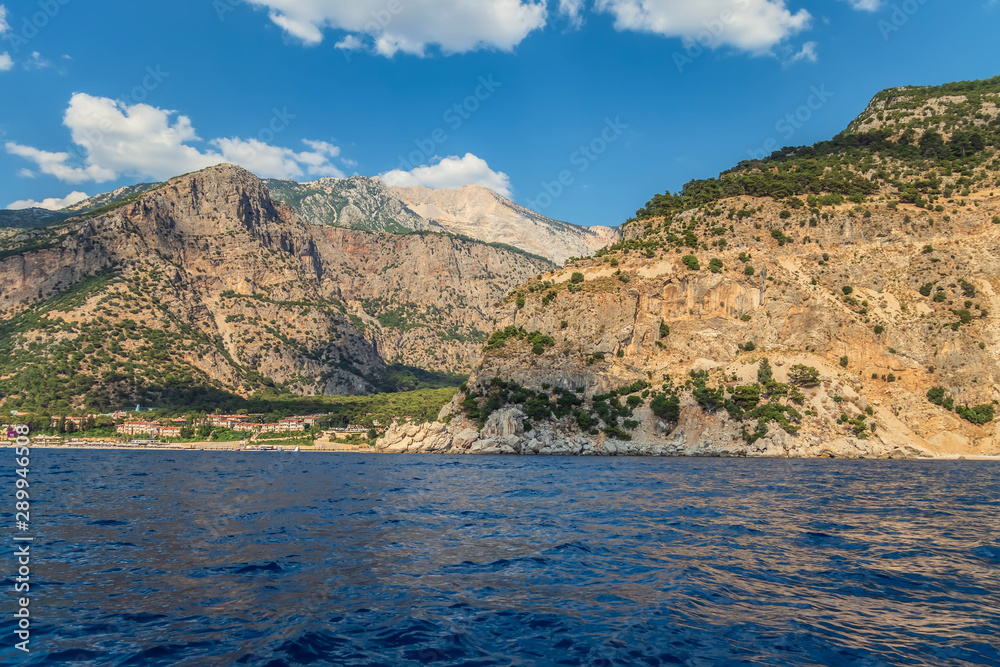 Rocks hills mountains island sea