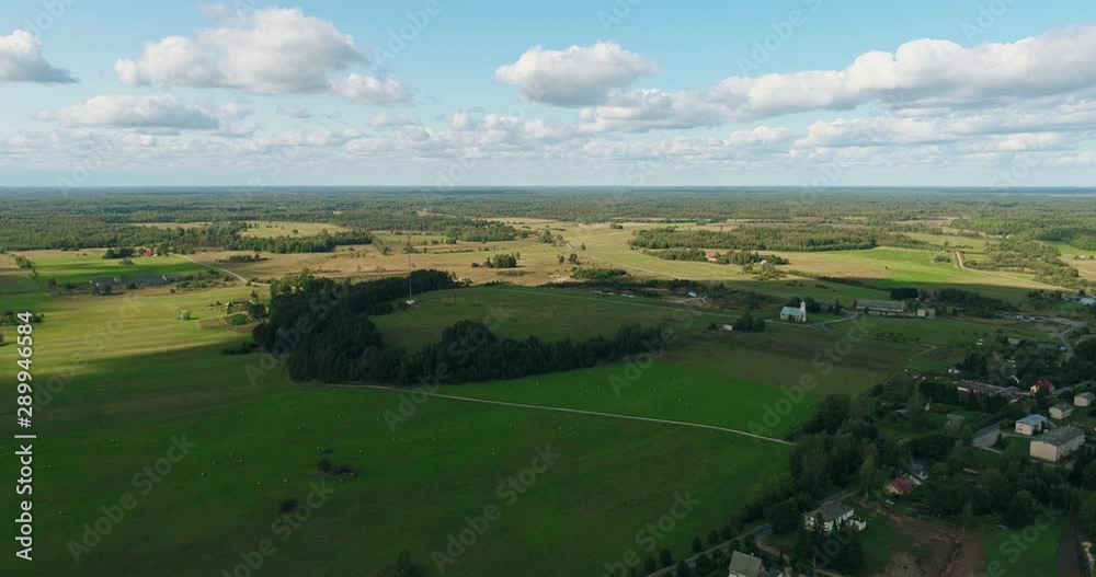 Aerial Flight Over summer forest and fields at sunset. Aerial footage. Amazing Lighting. Aerial Flight Over summer forest and fields at sunset. Aerial footage. Amazing Lighting.
