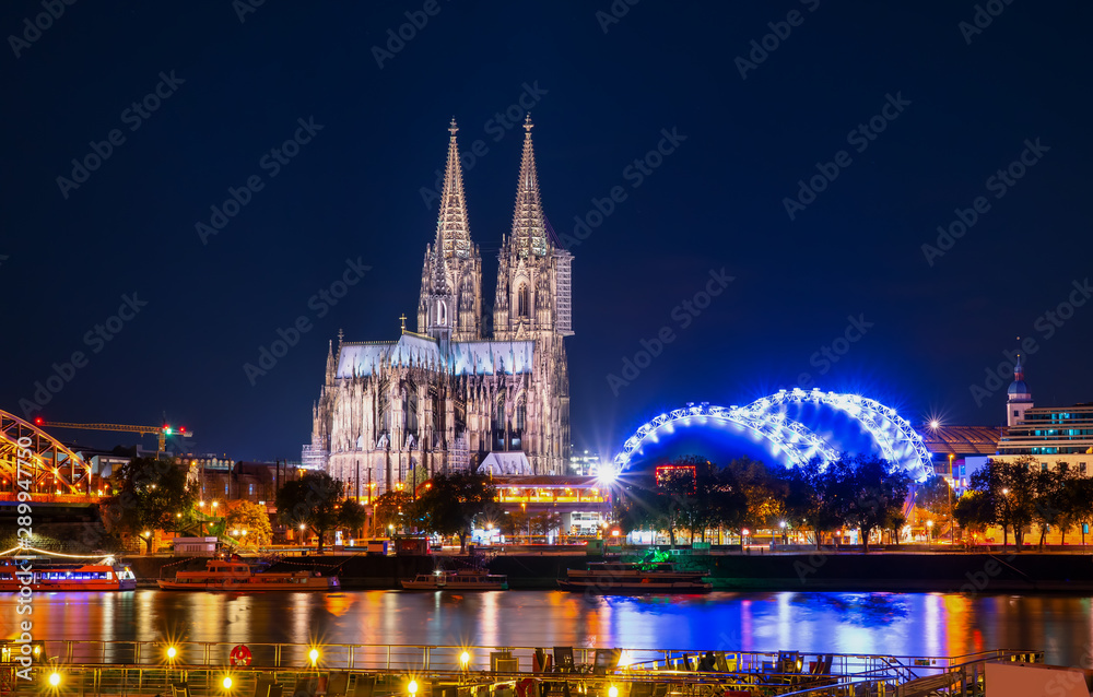 Cologne Cathedral and Hohenzollern Bridge at twilight , Cologne, Germany