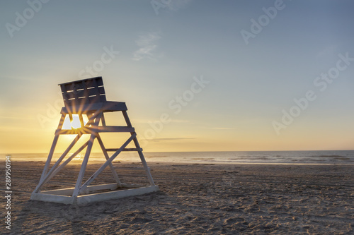 Lifeguard chair at sunrise © Lance