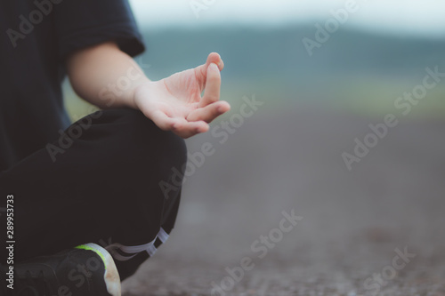 Asia woman exercise do yoga with happiness.