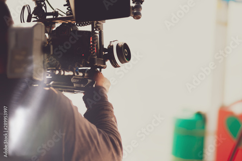 Wallpaper Mural cameraman working make record video film with happy. Torontodigital.ca