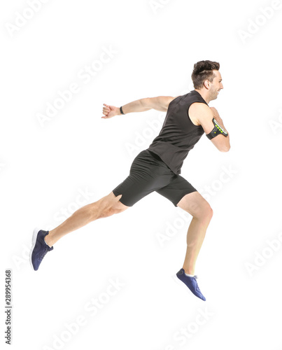 Fototapeta Naklejka Na Ścianę i Meble -  Running sporty man on white background