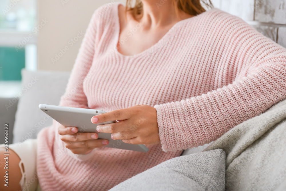 Woman with modern tablet computer at home, closeup Woman with modern tablet computer at home, closeup