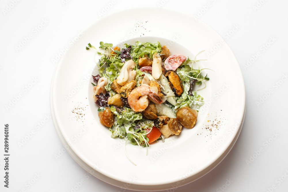seafood with vegetables in a plate seafood with vegetables in a plate