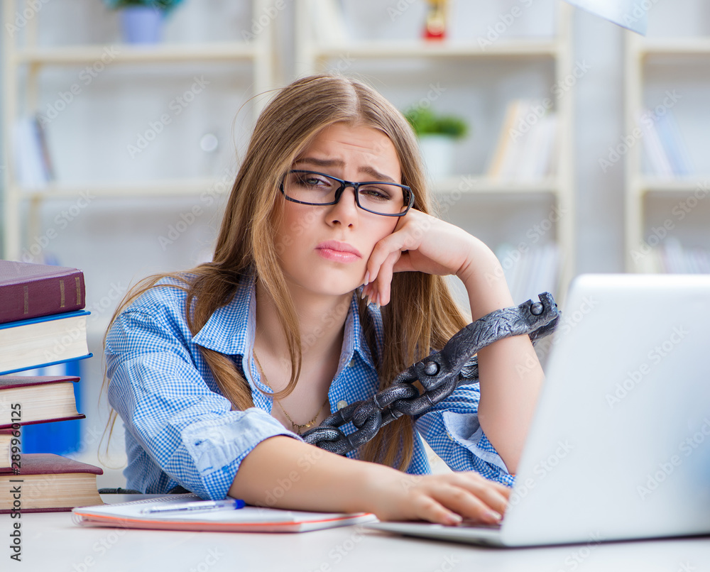 Young teenage female student preparing for exams at home Young teenage female student preparing for exams at home