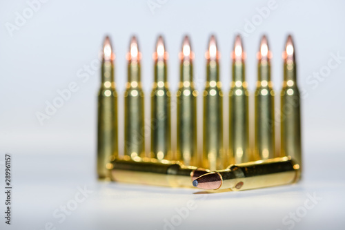 222 rifle ammunition on white background, selective focus