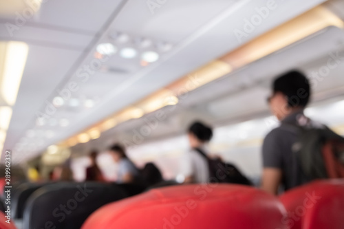 Blur inside airplane economy class and traveller travel.
