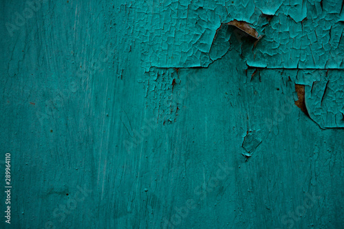 Texture of an old cracked paint coated surface. Background image of a painted metal surface