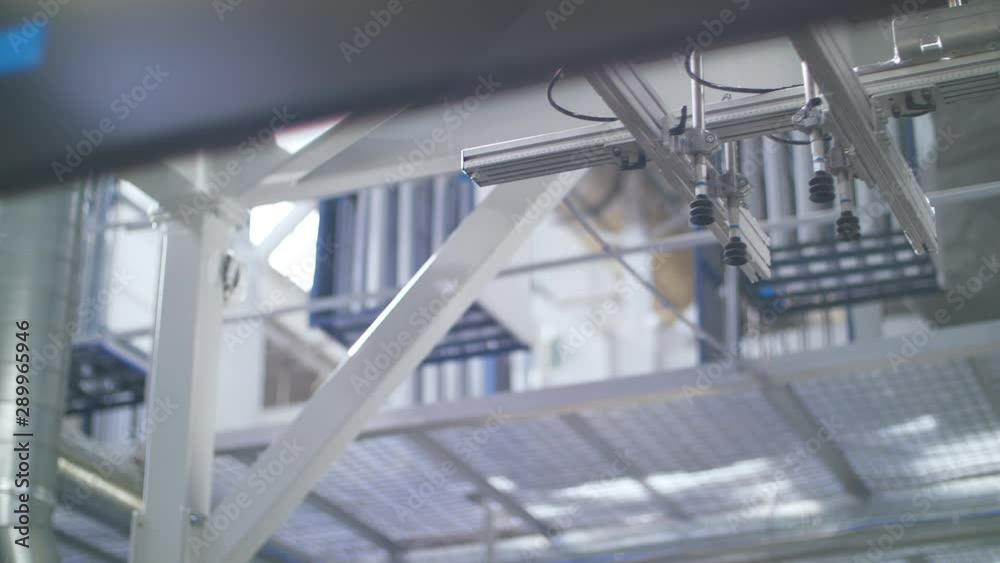 Robotic manipulator working on conveyor line. Household appliances factory Robotic manipulator working on conveyor line. Household appliances factory