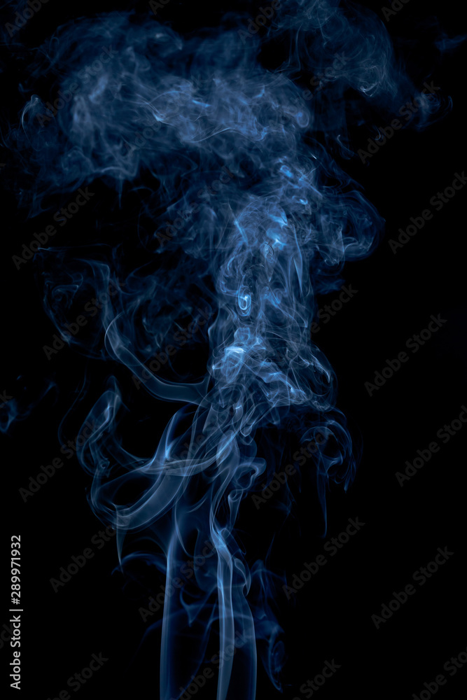Blue smoke on dark background Blue smoke on dark background