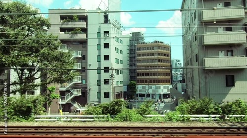 Japan Railway train window. Tokyo city landscape. Shibuya to Harajuku