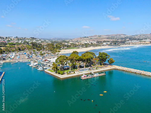 Aerial view of Dana Point Harbor and her marina with yacht and sailboat. southern Orange County, California. USA