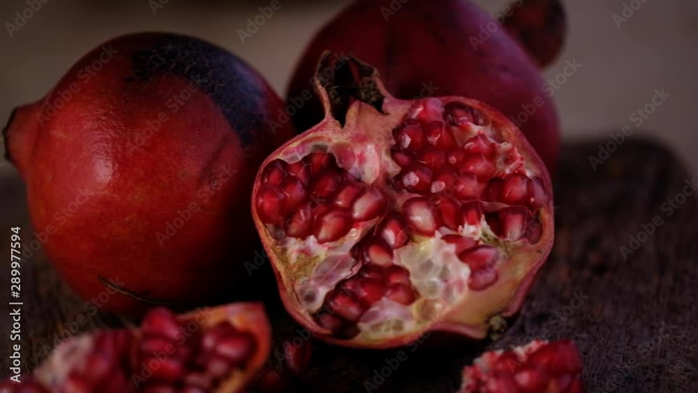 slide shot of pomegranate and tropical fruit on a wooden bench, slide shot of pomegranate and tropical fruit on a wooden bench,