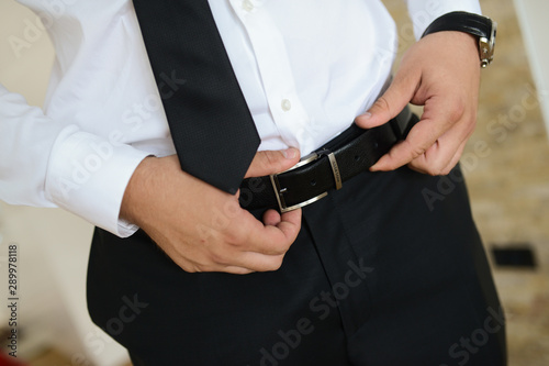 A businessman is preparing to meet with clients