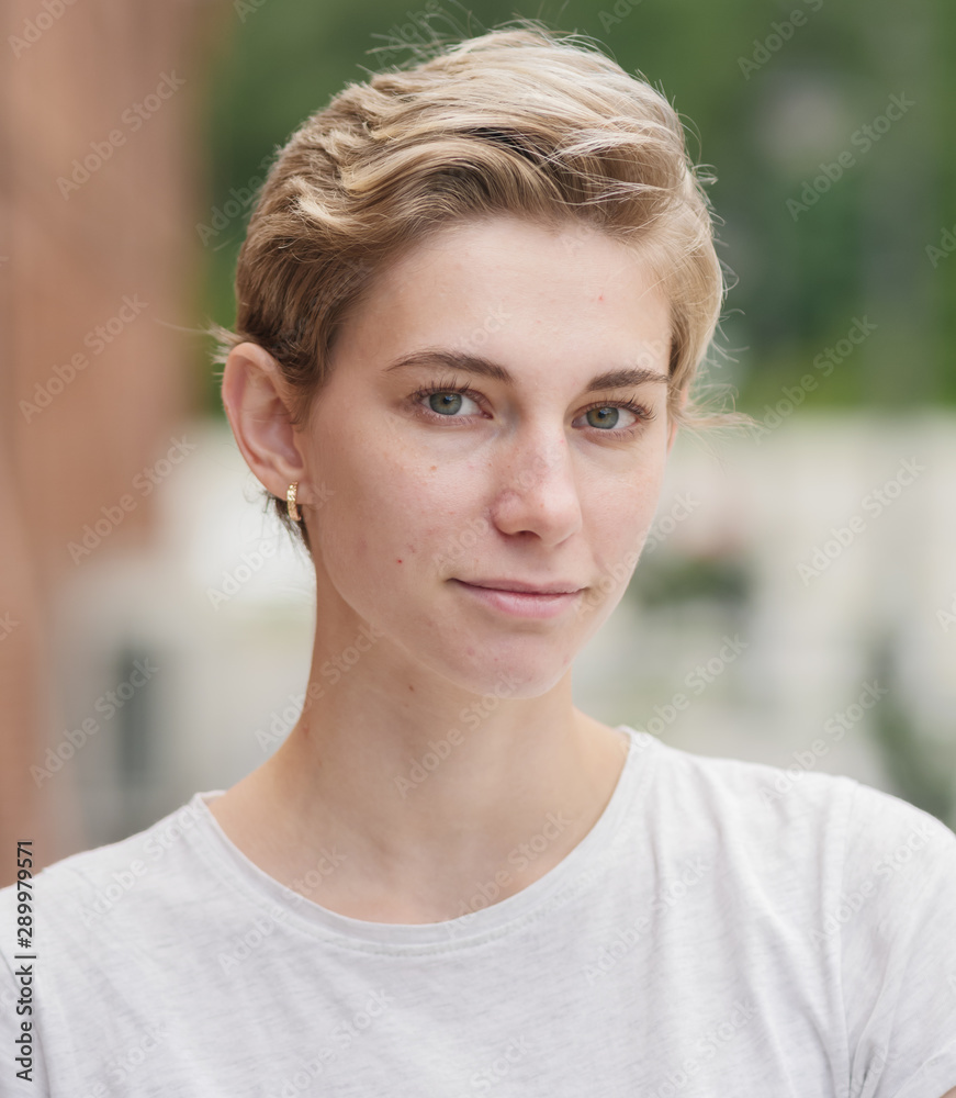 Portrait of beautiful woman with short hair and no retouch. Portrait of beautiful woman with short hair and no retouch.